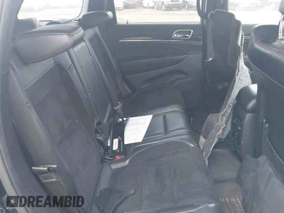 2017 Jeep Grand Cherokee Trailhawk with VIN 1C4RJFLG3HC674489, listed as a IAAI auction lot 42049006 with 91,892 mi miles and . Bid and sale history available at DreamBid. Image 8.