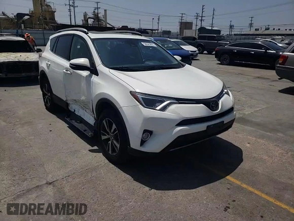 2018 Toyota RAV4 XLE with VIN JTMWFREVXJD118021, listed as a Copart auction lot 58845805 with 108,068 mi miles and Salvage title. Bid and sale history available at DreamBid. Image 14.