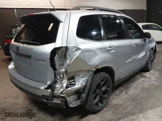 2015 Subaru Forester 2.5i Touring with VIN JF2SJAUC8FH468456, listed as a IAAI auction lot 41132284 with 188,408 mi miles. Bid and sale history available at carsss.com. Image 4.