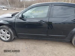 2013 Dodge Avenger SXT with VIN 1C3CDZCG5DN741112, listed as a IAAI auction lot 41838733 with 179,000 mi miles and . Bid and sale history available at carsss.com. Image 14.