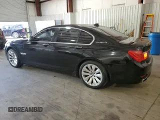 2011 BMW 7 Series with VIN WBAKX6C50BC197118, listed as a Copart auction lot 73686234 with 166,393 mi miles and Clean title. Bid and sale history available at DreamBid. Image 2.