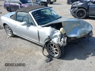 2003 Mazda MX-5 Miata Cloth with VIN JM1NB353630303339, listed as a IAAI auction lot 41445489 with 217,128 mi miles and . Bid and sale history available at DreamBid. Image 1.