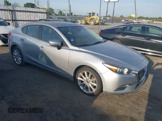 2017 Mazda 3 Touring z VIN JM1BN1V75H1114684, wystawiony jako IAAI lot #42025336 z przebiegiem 101 526 mil mil oraz . Historia ofert i sprzedaży dostępna na DreamBid. Obrazek 1.