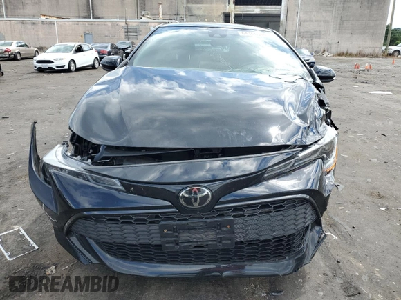 2021 Toyota Corolla Hatchback SE with VIN JTND4MBE8M3110672, listed as a Copart auction lot 64166344 with 50,325 mi miles and Salvage Title. Bid and sale history available at carsss.com. Image 5.
