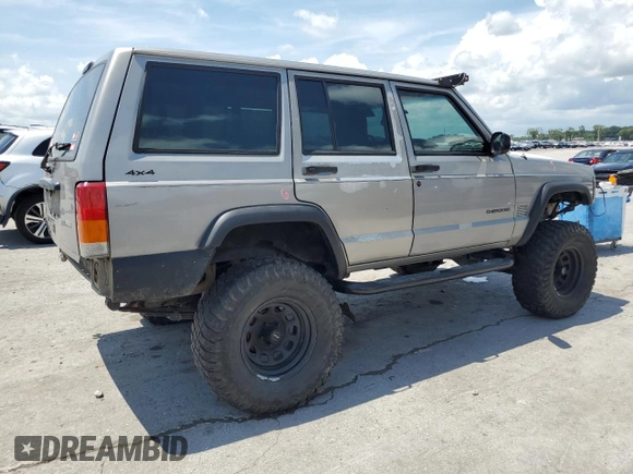 2000 Jeep Cherokee SE with VIN 1J4FF28SXYL140930, listed as a Copart auction lot 59191035 with 248,598 mi miles and Salvage title. Bid and sale history available at DreamBid. Image 3.