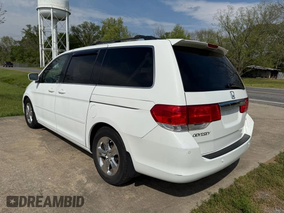 2010 Honda Odyssey Touring with VIN 5FNRL3H94AB047330, listed as a Copart auction lot 54064195 with 193,979 mi miles and Clean Title. Bid and sale history available at carsss.com. Image 3.