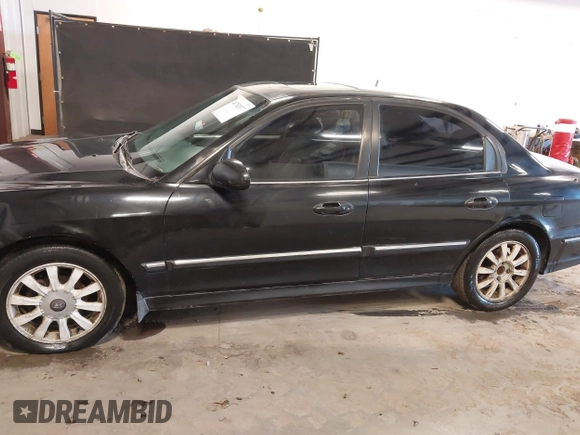 2003 Hyundai Sonata GLS with VIN KMHWF35H33A782779, listed as a IAAI auction lot 41702937 with 285,264 mi miles. Bid and sale history available at carsss.com. Image 15.