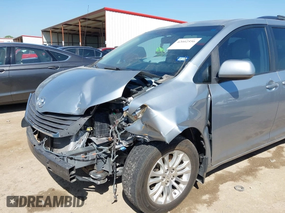 2011 Toyota Sienna XLE AAS with VIN 5TDYK3DC2BS048831, listed as a IAAI auction lot 42002556 with 231,906 mi miles and . Bid and sale history available at DreamBid. Image 6.