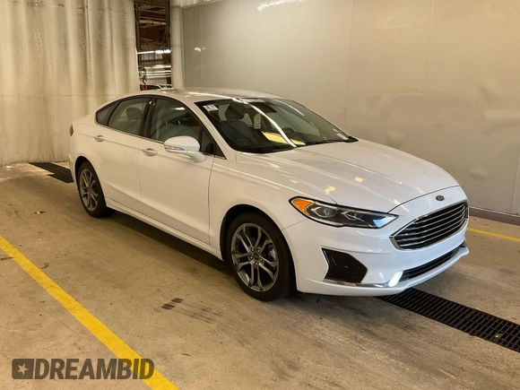 2020 Ford Fusion SEL z VIN 3FA6P0CD4LR177021, wystawiony jako IAAI lot #42743422 z przebiegiem 81 131 mil mil oraz . Historia ofert i sprzedaży dostępna na DreamBid. Obrazek 5.