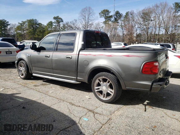 2002 Ford F-150 Harley Davidson with VIN 1FTRW07312KD72573, listed as a Copart auction lot 44971685 with 0 mi miles and Clean Title. Bid and sale history available at carsss.com. Image 2.
