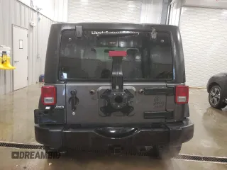 2017 Jeep Wrangler Willys Wheeler with VIN 1C4AJWAG9HL696710, listed as a Copart auction lot 88744905 with 66,800 mi miles and Salvage Title. Bid and sale history available at DreamBid. Image 6.