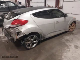 2015 Hyundai Veloster RE:FLEX with VIN KMHTC6AD4FU230324, listed as a IAAI auction lot 41292154 with 99,147 mi miles. Bid and sale history available at carsss.com. Image 4.