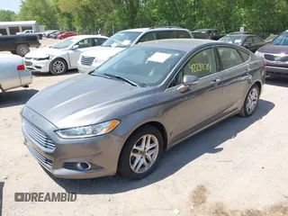 2014 Ford Fusion SE with VIN 3FA6P0HD7ER328428, listed as a IAAI auction lot 42242714 with 74,199 mi miles and . Bid and sale history available at DreamBid. Image 2.