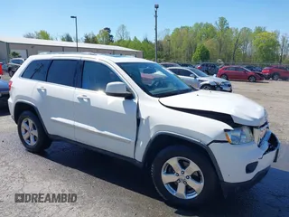 2011 Jeep Grand Cherokee Laredo with VIN 1J4RR4GG3BC736370, listed as a IAAI auction lot 42053862 with 169,269 mi miles and . Bid and sale history available at DreamBid. Image 1.