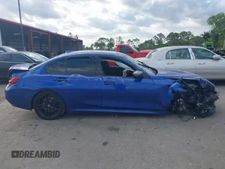 2020 BMW 3 Series M340i xDrive with VIN WBA5U9C00LA379345, listed as a IAAI auction lot 41256225 with 57,856 mi miles and . Bid and sale history available at DreamBid. Image 13.