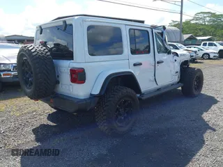 2022 Jeep Wrangler Unlimited Rubicon with VIN 1C4HJXFG8NW130156, listed as a IAAI auction lot 42004630 with 129,313 mi miles and . Bid and sale history available at DreamBid. Image 4.