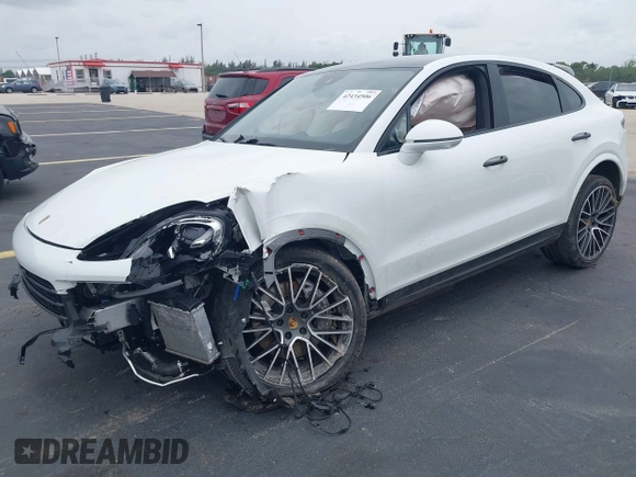 2023 Porsche Cayenne with VIN WP1BA2AY2PDA26896, listed as a IAAI auction lot 42434506 with 10,577 mi miles and . Bid and sale history available at DreamBid. Image 2.