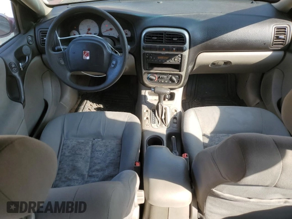2004 Saturn L L300 1 z VIN 1G8JC54FX4Y504855, wystawiony jako Copart lot #70846524 z przebiegiem 158 865 mil mil oraz Szkody całkowita. Historia ofert i sprzedaży dostępna na DreamBid. Obrazek 8.