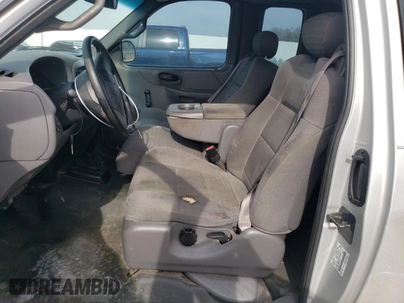 2002 Ford F-150 XL with VIN 1FTRX17282NA63790, listed as a Copart auction lot 42057394 with 158,054 mi miles and Salvage Title. Bid and sale history available at carsss.com. Image 7.