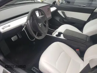 2019 Tesla Model 3 Mid Range z VIN 5YJ3E1EA2KF486532, wystawiony jako Copart lot #58082635 z przebiegiem 51 920 mil mil oraz Tytuł czysty. Historia ofert i sprzedaży dostępna na DreamBid. Obrazek 7.