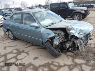 1999 Honda Civic LX z VIN 2HGEJ6671XH594020, wystawiony jako IAAI lot #41319222 z przebiegiem 196 046 mil mil oraz . Historia ofert i sprzedaży dostępna na DreamBid. Obrazek 1.