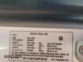 2023 Tesla Model 3 with VIN 5YJ3E1EA8PF394705, listed as a Copart auction lot 52319945 with 58,193 mi miles and Salvage title. Bid and sale history available at DreamBid. Image 12.