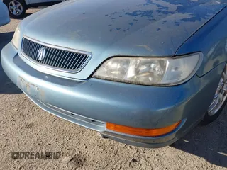 1999 Acura CL Premium z VIN 19UYA2257XL008773, wystawiony jako IAAI lot #41560238 z przebiegiem 179 945 mil mil oraz . Historia ofert i sprzedaży dostępna na DreamBid. Obrazek 6.