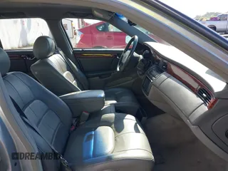2004 Cadillac DeVille z VIN 1G6KD54Y74U248869, wystawiony jako IAAI lot #42164504 z przebiegiem 204 828 mil mil oraz . Historia ofert i sprzedaży dostępna na DreamBid. Obrazek 5.