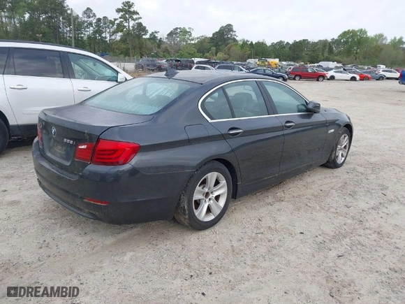 2012 BMW 5 Series 528i with VIN WBAXG5C58CDW24671, listed as a IAAI auction lot 41917583 with 167,098 mi miles. Bid and sale history available at carsss.com. Image 4.