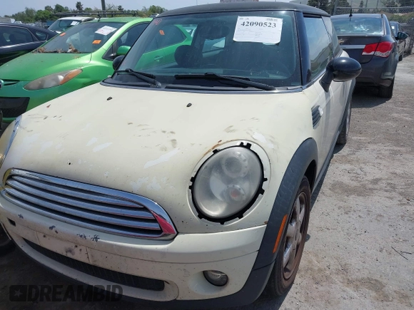 2009 MINI Cooper Hardtop with VIN WMWMF33569TU75508, listed as a IAAI auction lot 42090523 with 247,856 mi miles. Bid and sale history available at carsss.com. Image 6.