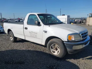 1998 Ford F-150 z VIN 2FTRF176XWCA94878, wystawiony jako IAAI lot #42128179 z przebiegiem 180 791 mil mil oraz . Historia ofert i sprzedaży dostępna na DreamBid. Obrazek 1.