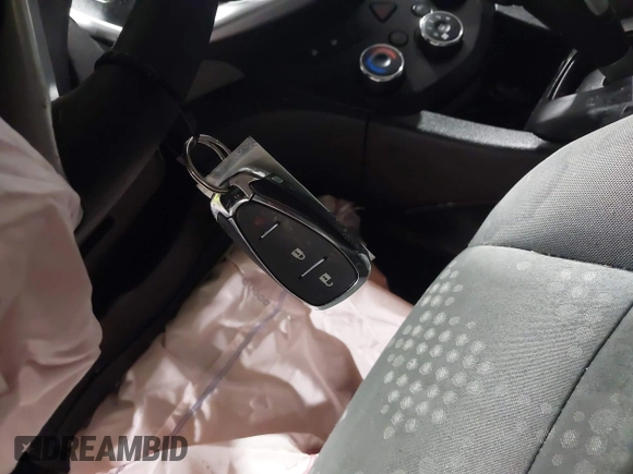 2020 Chevrolet Sonic LT with VIN 1G1JG6SB9L4110004, listed as a IAAI auction lot 41921452 with 106,676 mi miles and . Bid and sale history available at DreamBid. Image 11.