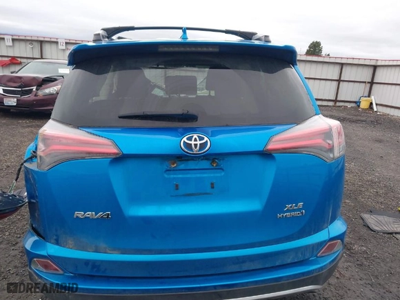 2016 Toyota RAV4 Hybrid XLE with VIN JTMRJREVXGD043129, listed as a IAAI auction lot 41786071 with 97,919 mi miles. Bid and sale history available at carsss.com. Image 16.