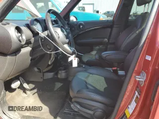 2013 MINI Countryman S z VIN WMWZC3C55DWP20563, wystawiony jako Copart lot #55493605 z przebiegiem 110 672 mil mil oraz Szkoda całkowita • Salvage title. Historia ofert i sprzedaży dostępna na DreamBid. Obrazek 7.