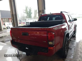 2019 Toyota Tacoma SR z VIN 3TMCZ5AN5KM220079, wystawiony jako IAAI lot #41856695 z przebiegiem 51 918 mil mil oraz . Historia ofert i sprzedaży dostępna na DreamBid. Obrazek 16.