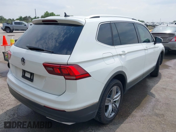 2020 Volkswagen Tiguan SE z VIN 3VV3B7AX4LM032609, wystawiony jako IAAI lot #42074359 z przebiegiem 52 404 mil mil oraz . Historia ofert i sprzedaży dostępna na DreamBid. Obrazek 4.
