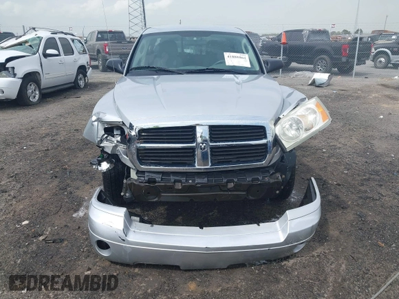 2007 Dodge Dakota SLT with VIN 1D7HE48KX7S122712, listed as a IAAI auction lot 41888864 with 114,384 mi miles and . Bid and sale history available at carsss.com. Image 12.