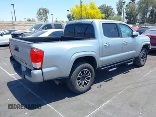 2022 Toyota Tacoma SR with VIN 3TYAX5GN4NT037625, listed as a IAAI auction lot 42382411 with 49,703 mi miles and . Bid and sale history available at DreamBid. Image 4.