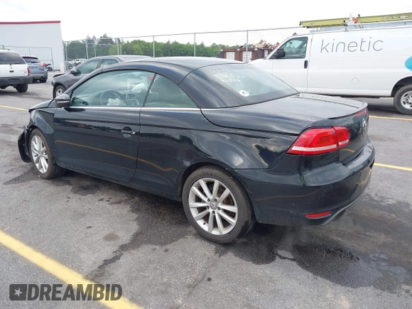 2015 Volkswagen Eos Komfort with VIN WVWBW8AH5FV004034, listed as a IAAI auction lot 41981978 with 106,450 mi miles and . Bid and sale history available at DreamBid. Image 3.
