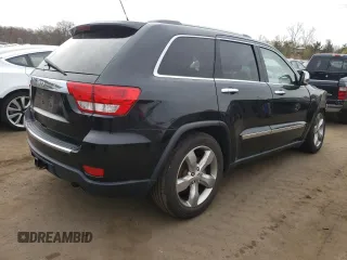 2011 Jeep Grand Cherokee Overland with VIN 1J4RR6GT9BC660730, listed as a Copart auction lot 53770745 with 106,351 mi miles and Salvage title. Bid and sale history available at DreamBid. Image 3.