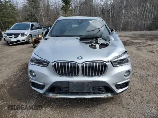 2016 BMW X1 xDrive28i with VIN WBXHT3C3XG5E49609, listed as a Copart auction lot 50213825 with Not Provided miles and Salvage Title. Bid and sale history available at carsss.com. Image 5.
