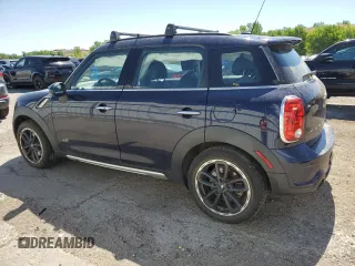 2016 MINI Countryman S with VIN WMWZC5C54GWT38489, listed as a Copart auction lot 63834335 with 102,564 mi miles and Salvage title. Bid and sale history available at DreamBid. Image 2.