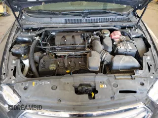 2015 Ford Taurus SEL with VIN 1FAHP2E84FG102318, listed as a Copart auction lot 61744685 with 82,149 mi miles and Salvage title. Bid and sale history available at DreamBid. Image 11.
