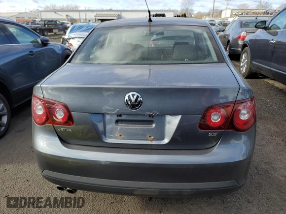 2009 Volkswagen Jetta z VIN 3VWHZ71KX9M011693, wystawiony jako Copart lot #87076904 z przebiegiem 157 478 mil mil oraz Szkoda całkowita • Salvage title. Historia ofert i sprzedaży dostępna na DreamBid. Obrazek 6.