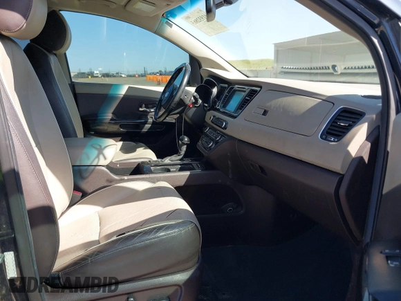 2016 Kia Sedona SX-L with VIN KNDME5C15G6083811, listed as a IAAI auction lot 41932863 with 124,218 mi miles. Bid and sale history available at carsss.com. Image 5.