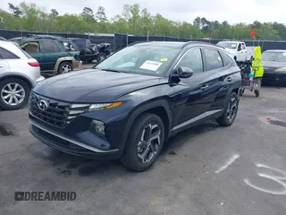 2022 Hyundai Tucson SEL Convenience with VIN KM8JFCA10NU049450, listed as a IAAI auction lot 41915300 with 23,584 mi miles and . Bid and sale history available at carsss.com. Image 17.