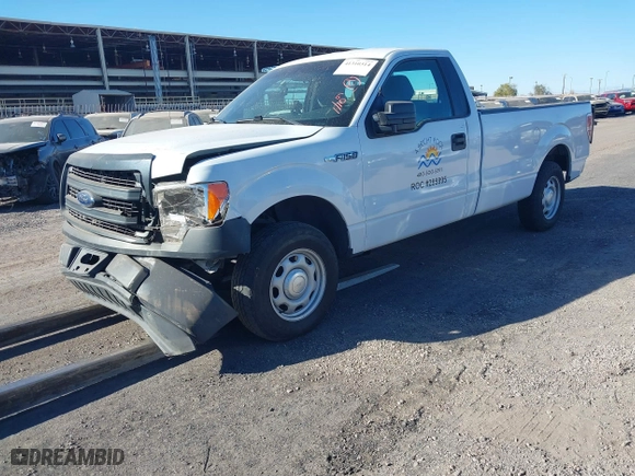 2014 Ford F-150 XL with VIN 1FTMF1CM4EKE98669, listed as a IAAI auction lot 41310314 with 133,239 mi miles. Bid and sale history available at carsss.com. Image 2.