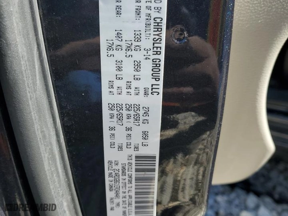 2014 Dodge Grand Caravan SE with VIN 2C4RDGBG1ER340401, listed as a Copart auction lot 48037895 with 137,735 mi miles and Salvage Title. Bid and sale history available at carsss.com. Image 15.