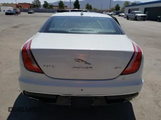 2019 Jaguar XJ Portfolio with VIN SAJWA2G72K8W21087, listed as a Copart auction lot 66017344 with 22,671 mi miles and Salvage Title. Bid and sale history available at DreamBid. Image 6.