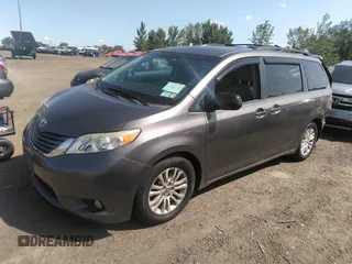 2014 Toyota Sienna XLE with VIN 5TDYK3DC2ES418860, listed as a IAAI auction lot 40139260 with 67,599 mi miles and . Bid and sale history available at DreamBid. Image 21.